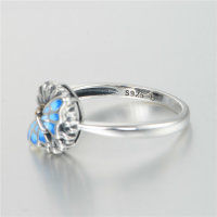 anillo plata/chapado,diseño de flor con mariposa con esmalte azul - Foto 2