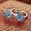 anillo plata/chapado,diseño de mariposa con esmalte azul - Foto 5