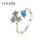 anillo plata/chapado,diseño de tres flores con un circón azul grande - 1