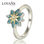 anillo plata/chapado + un flor con esmalte verde +dorado 18k - 1