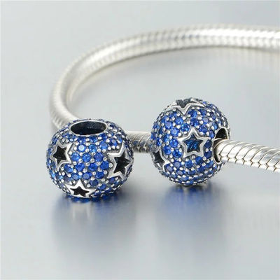 Charms plata oxidada con espinelas azules de Lovans jewelry