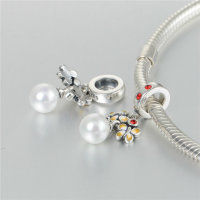colgante plata para pulsera, diseño de anillo,mariposa con piedras y perla. - Foto 3