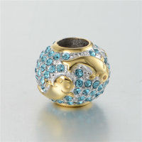 colgante plata para pulsera, diseño de pola dorada con piedras azules - Foto 2