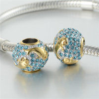colgante plata para pulsera, diseño de pola dorada con piedras azules - Foto 4