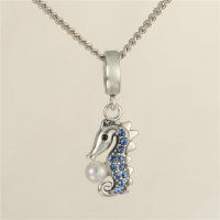 colgante plata para pulsera, diseño de un hipocampo con una perla+pieras azules - Foto 2