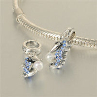 colgante plata para pulsera, diseño de un hipocampo con una perla+pieras azules - Foto 3
