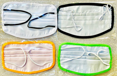 Cubre bocas de doble tela con tela anti-fluidos lavable - Foto 2