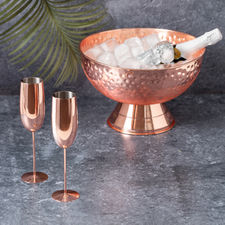 Elegante champanera en acero inoxidable con recubrimiento de cobre galvanizado.