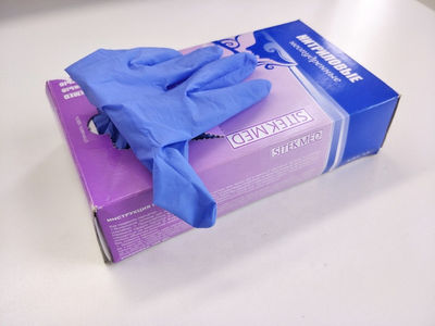Envase lleno de guantes de nitrilo - Foto 2