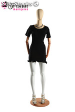 Faceless female mannequin with articulable arms