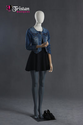 Faceless female mannequin with articulated arms and hands