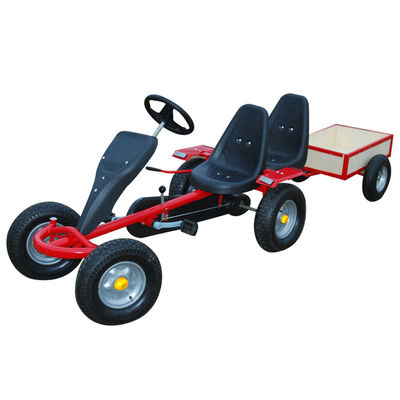 Go-Kart de pedales en rojo con dos asientos y remolque