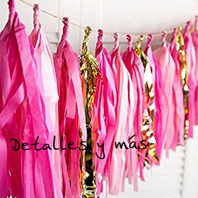 Guirnalda de tiras rosa y oro. Banderines y pompones para decorar