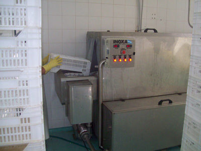 Lavadora de bandejas y moldes automatica