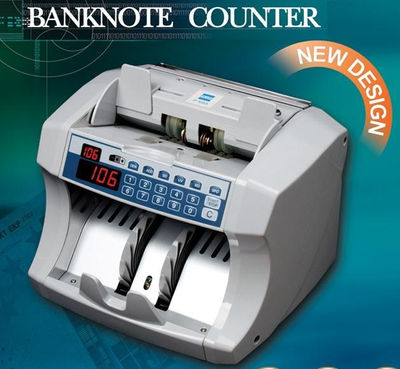 Machine a compter les billets de banque