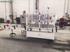 Machine à remplir linéale de 4 pistons de 10 litres à 25 litres