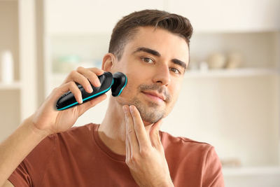 Máquina de afeitar eléctrica 3 en 1 afeitadora, recortadora,recortadora de nariz - Foto 2