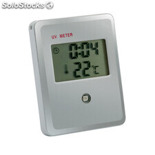 Medidor digital de radiación UV con termómetro y reloj.