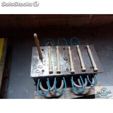Molds for the production of handles
