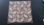 Mosaico di pietre naturali bicolore ( imperadore light e imperador dark) su rete - 1
