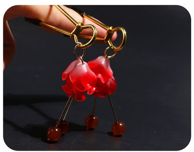 Pinza para pezones con forma de flor de campana roja - Foto 2