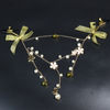 Pinza para pezones estilo collar con perlas florales y cascabeles