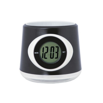 Reloj digital de sobremesa con macetero integrado y en