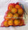 Saco malla raschel para 5 Kg de naranjas, color rojo con atador en boca. - 1
