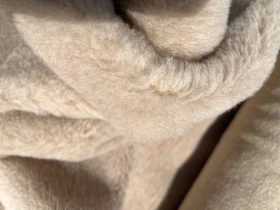 scampolo tessuto eco pelliccia avorio