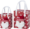 Set de bolsas con detalle de Papa Noel en forma de caja y con asas