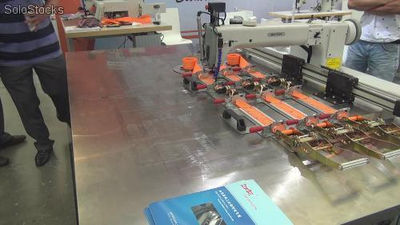 Sistema de automatización integral para coser la eslingas de carga y amarre