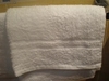 toallas blancas baño hosteleria